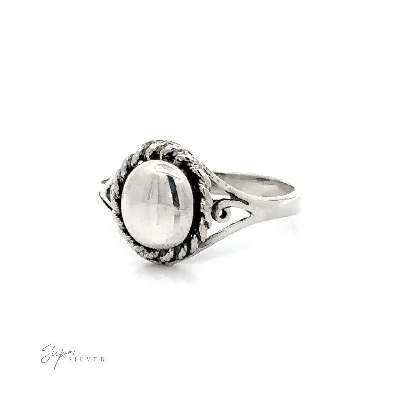 Silver Ring With Oval Design With A Rope Border