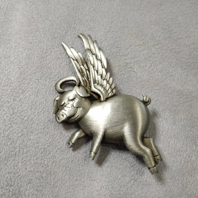 Flying pig brooch by JJ pewter